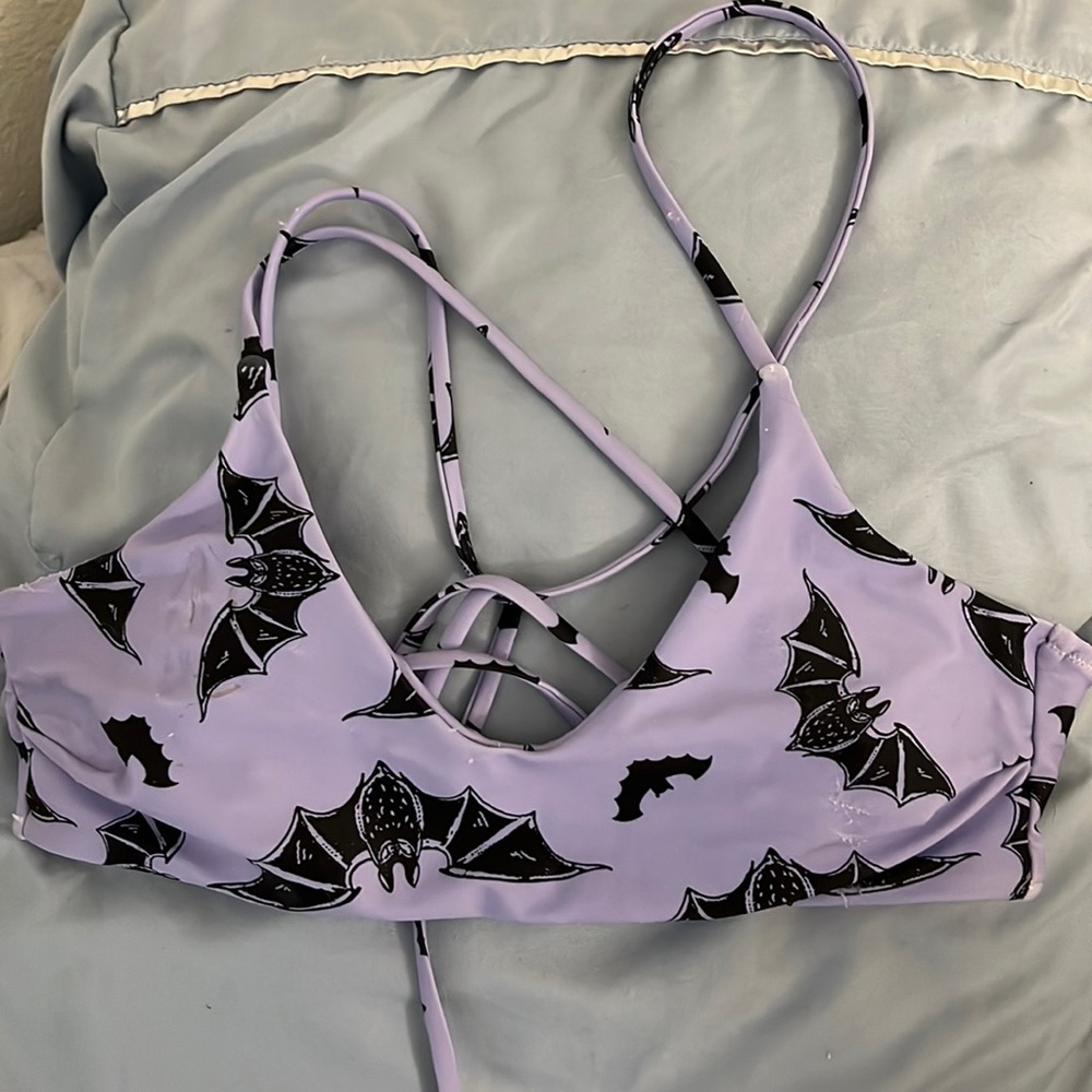 Bikini top only! Light purple (lilac) bikini top with black bats. Fairly worn.
